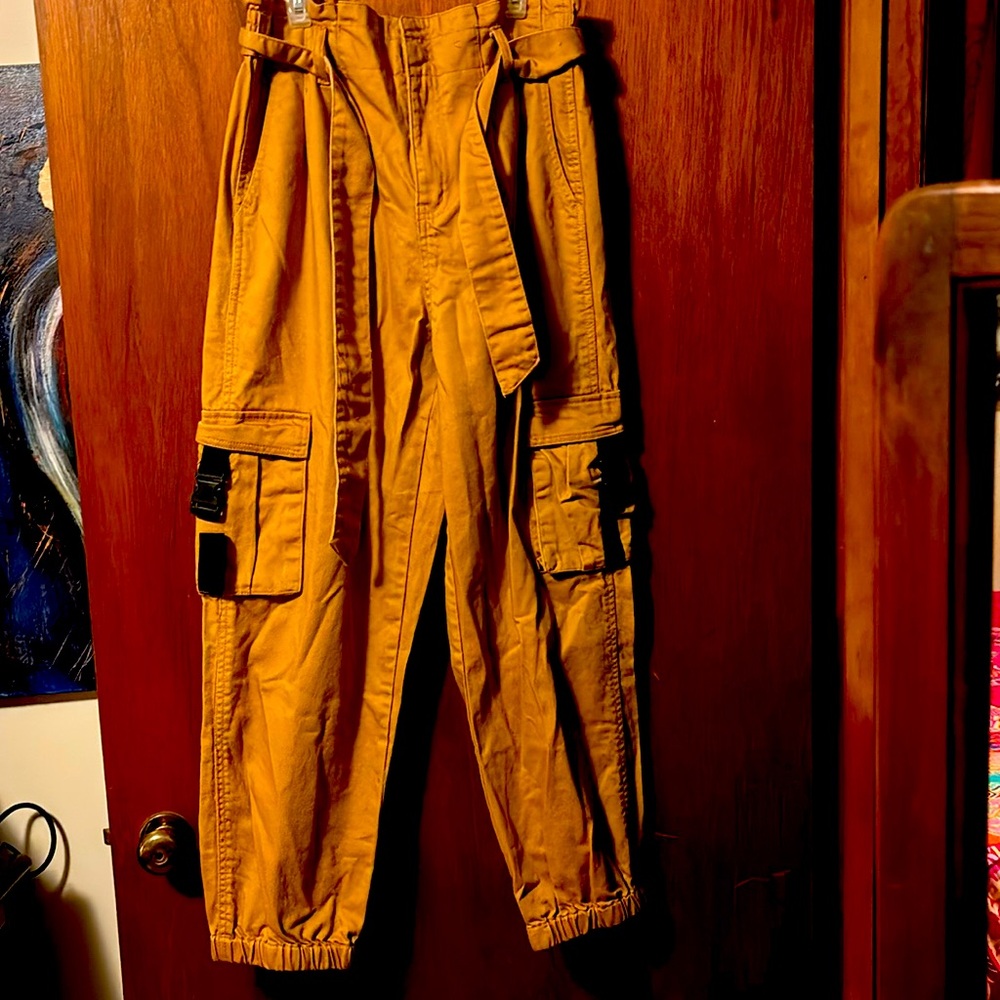 Orange/Red cargo pants.